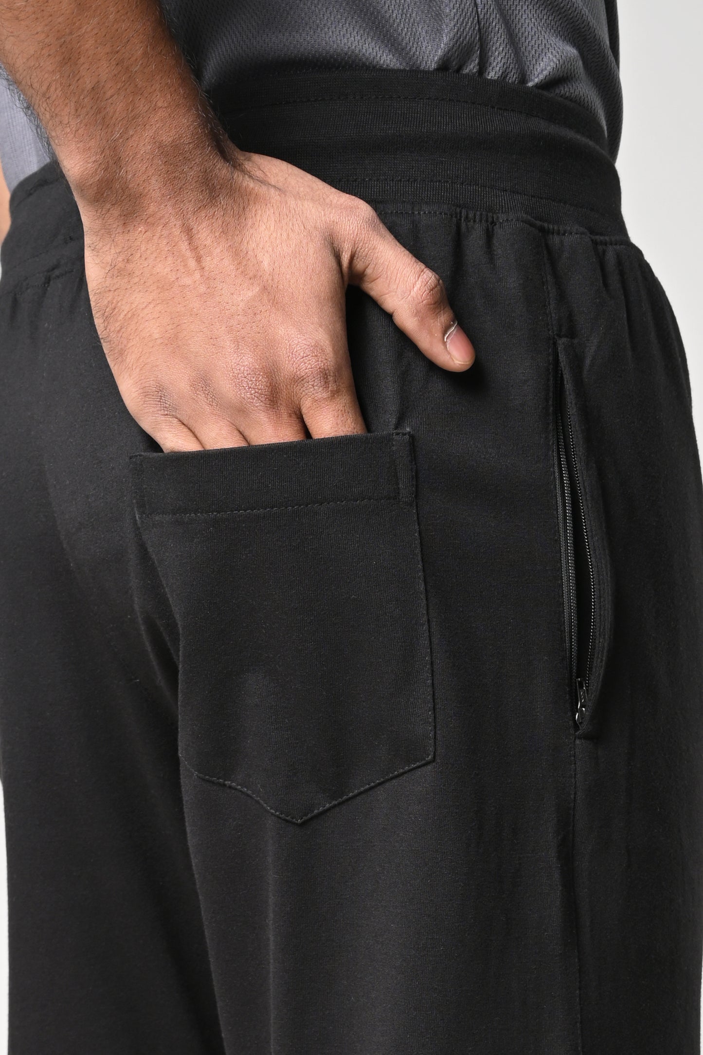 Men’s black hosiery fabric track pants with pockets