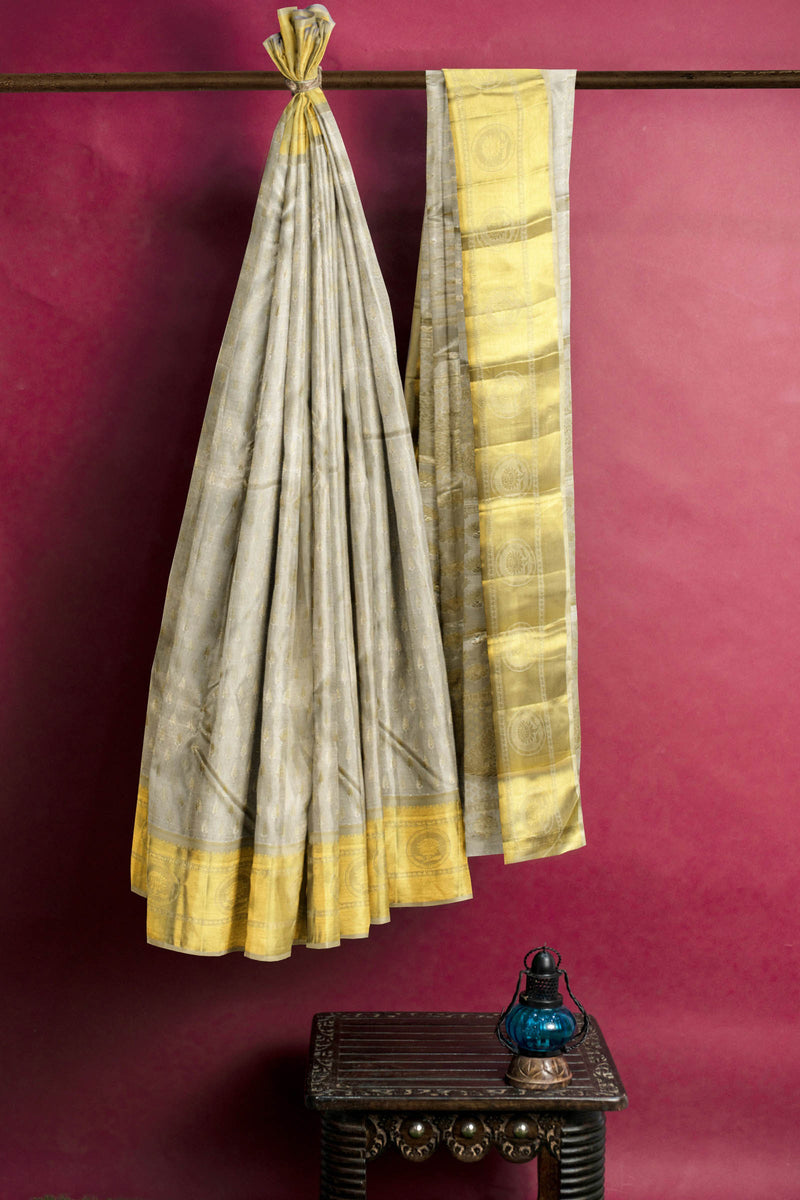 Off White Kanchipuram Bridal Pure Silk Pine Tree Gold Butta Body Self Pallu Saree