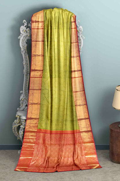 Green Kanchipuram Bridal Pure Silk Peacock Coin Body Peacock Border Pink Contrast Pallu Saree