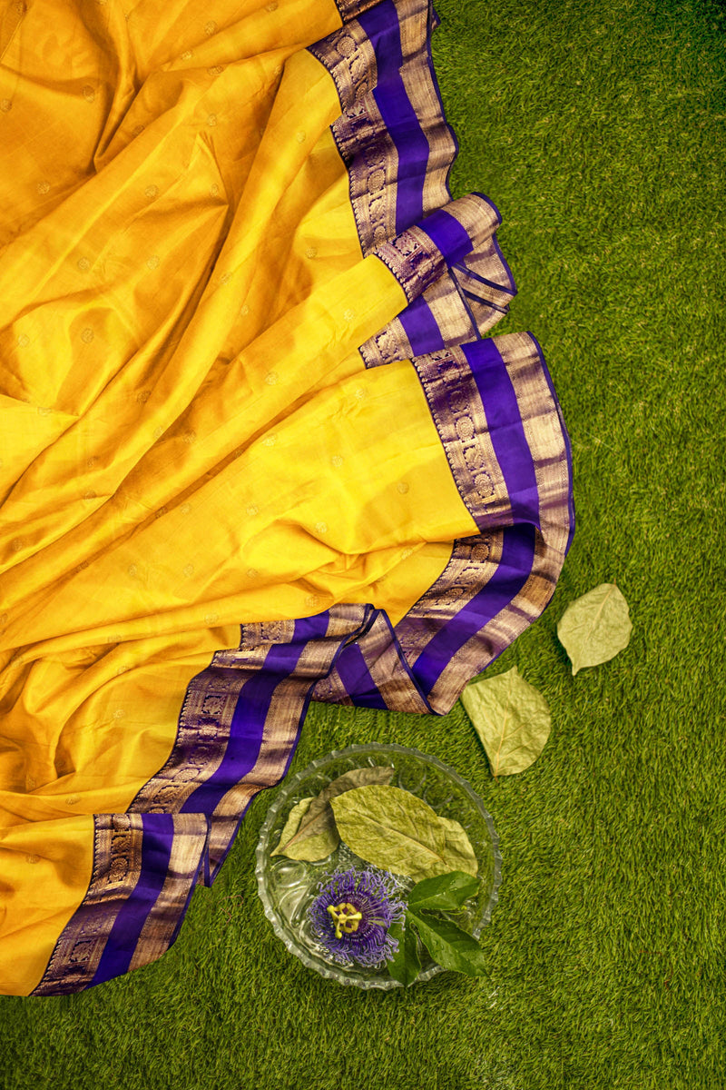 Yellow Light Weight Pure Silk  Plain Arani Conrast Double Border Saree