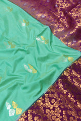 Light Green Double Jari Butta Purple Contrast Kottanj Border Semi Soft Silk Saree