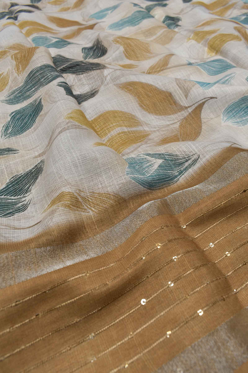 Offwhite Semi Linen Printed Leaves Simple Sequin Border Saree