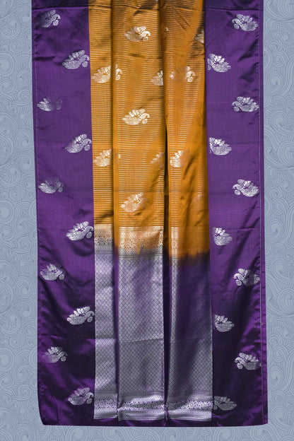 Mustard Semi Soft Silk Contrast Violet Pallu Peacock Butta Saree