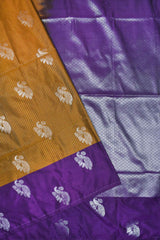 Mustard Semi Soft Silk Contrast Violet Pallu Peacock Butta Saree