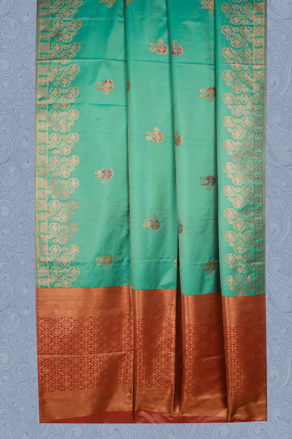 Green Semi Soft Silk Fancy Flower Butta Orange Contrast Pallu Saree