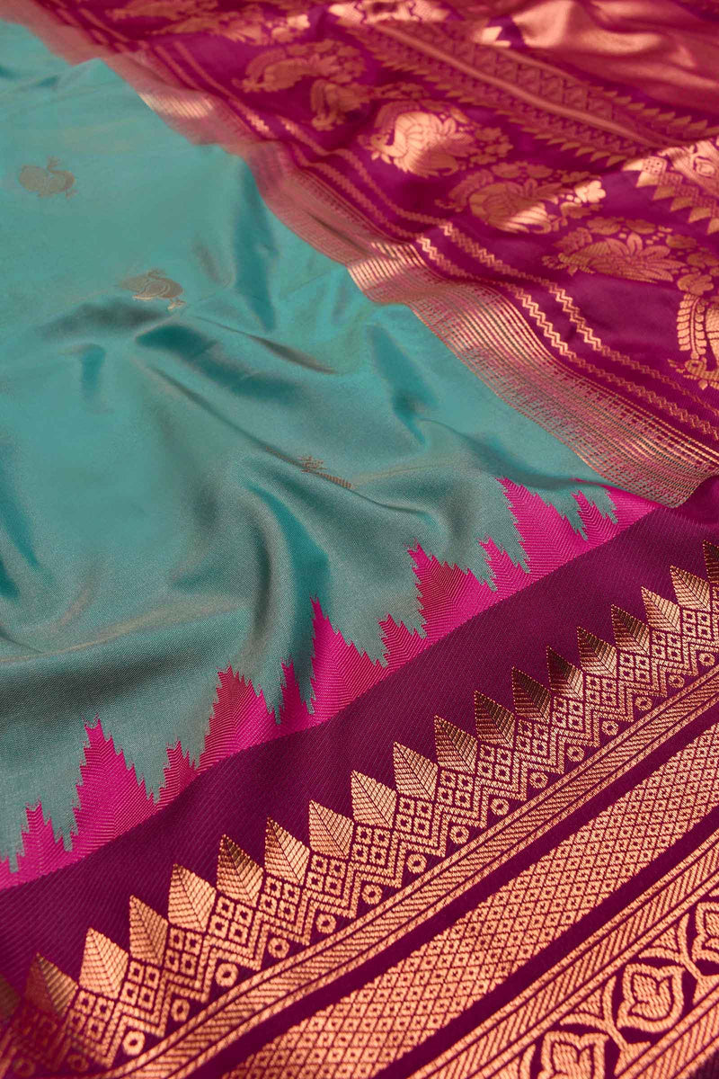 Green Semi Soft Silk Peacock Butta Contrast Pallu Saree