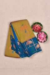 Green Semi Silk Saree Kudai Butta Contrast Blue Blouse