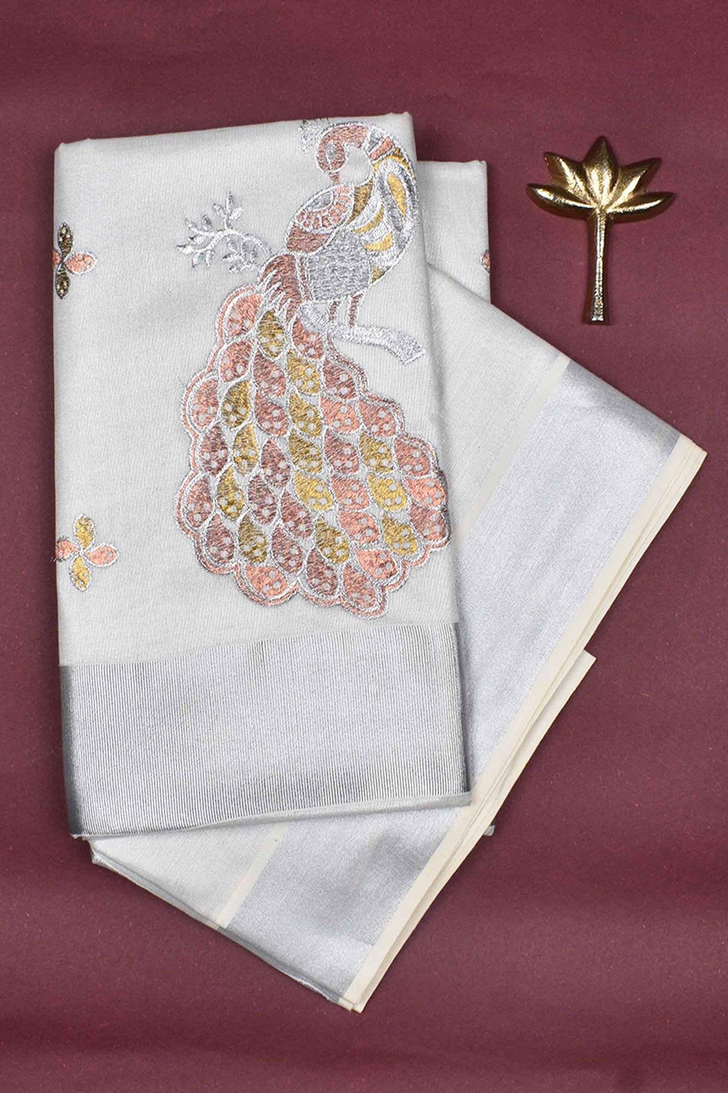 Silver Kerala Tissue Cotton with Rose/Gold Peacock Butta Saree