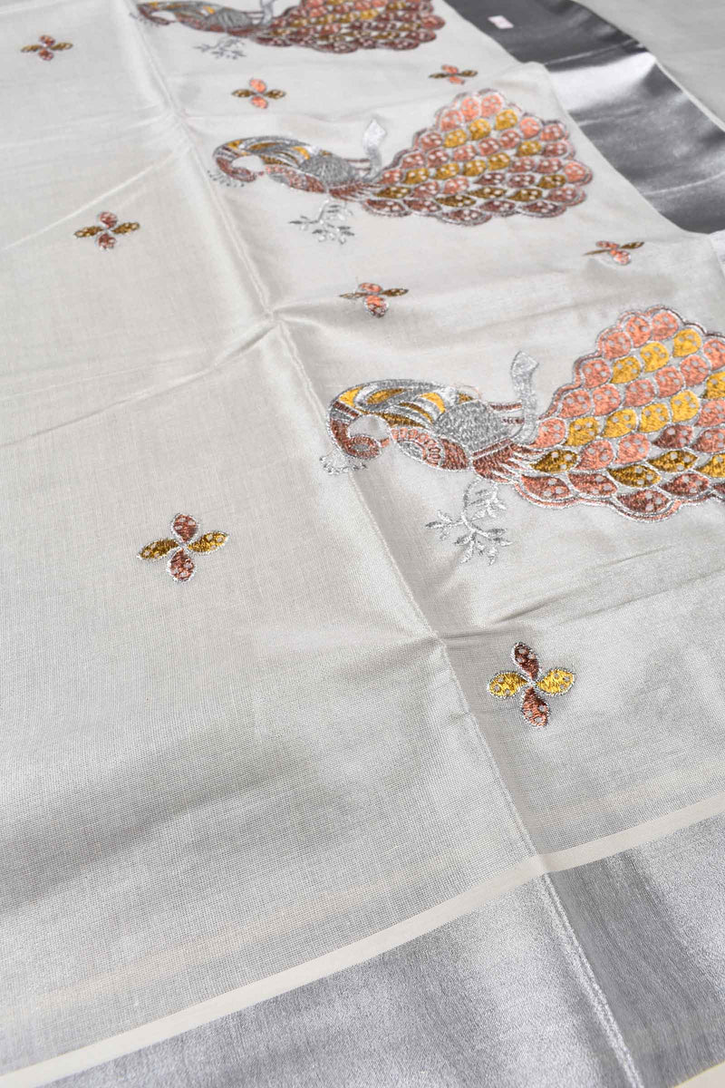 Silver Kerala Tissue Cotton with Rose/Gold Peacock Butta Saree