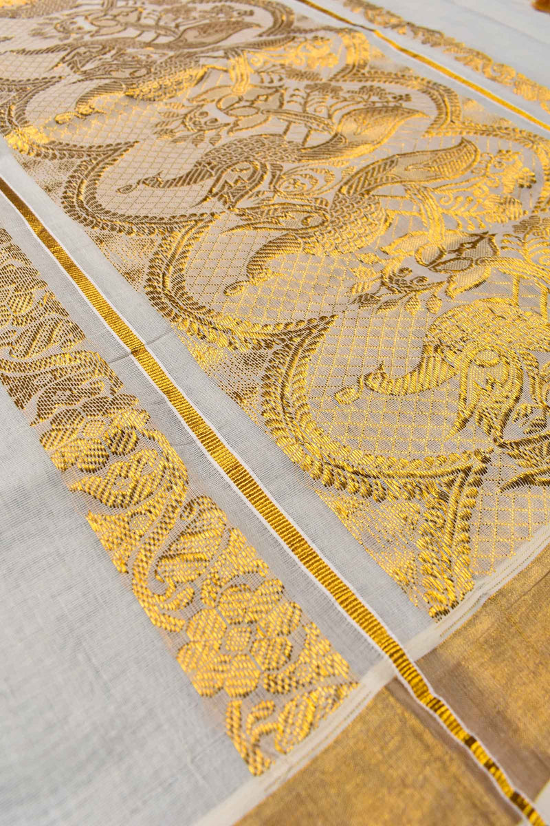 Kerala Cotton Peacock Garden Pallu Gold Tasels Saree