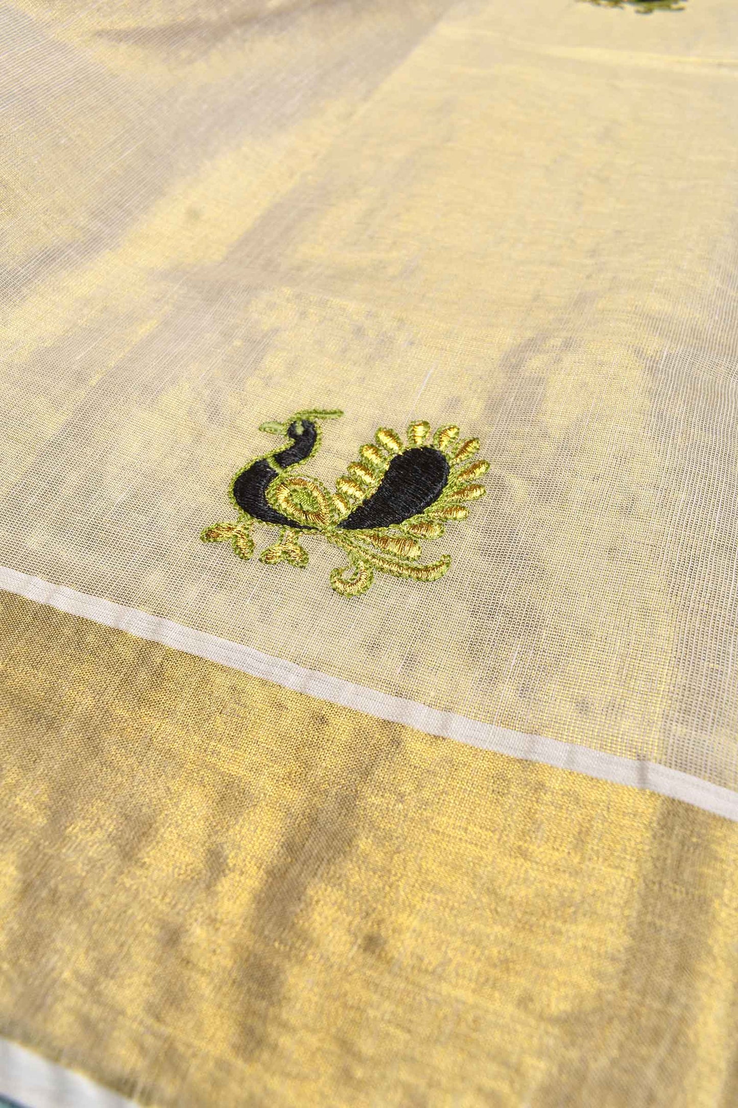 Off White Kerala Tissue Peacock Embroidered Butta Golden Zari Saree