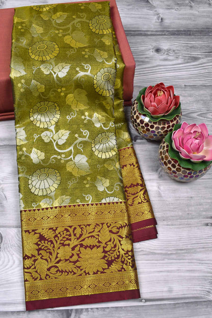 Leaf Green Semi Silk Floral Jacquard Contrast Maroon Floral Border Bridal Tissue Saree