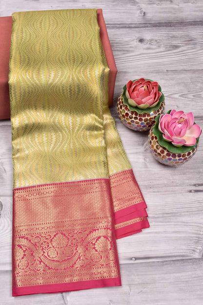 Light Green Semi Silk Fancy Curves Design Contrast Red Border Bridal Tissue Saree