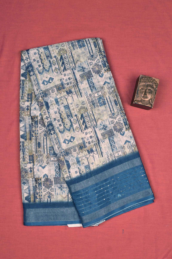 Off White With Blue Semi Linen All Over Floral Design Blue Sequence Border Saree