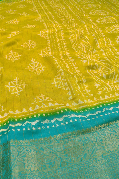 Lime Yellow Soft Marshmallow Fancy Print Contrast Blue Border Saree