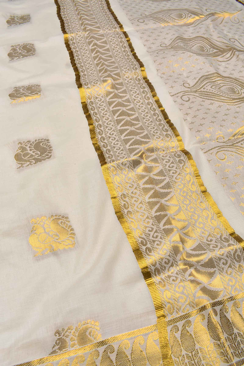 Off White Pure Kerala Cotton Peacock Butta Rich Pallu Paisely Border Golden Zari Border Saree