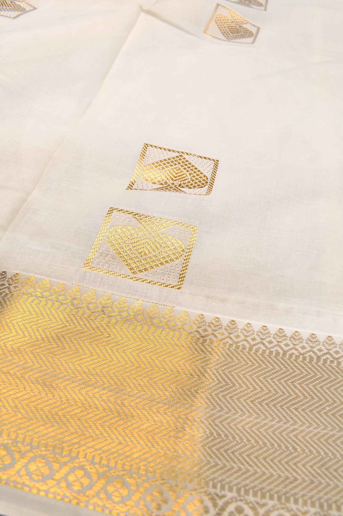 Off White Pure Kerala Cotton Small Square Butta Fancy Squares Pallu Gold Zari Border Saree