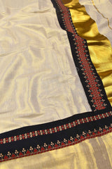 Off White Kerala Tissue Cotton Ajrakh Printed Gold Border Saree