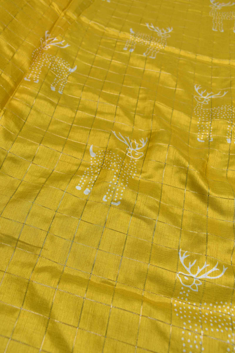 Golden Yellow Semi Dola Holiday Reindeers Printed Blue Zari Border Saree