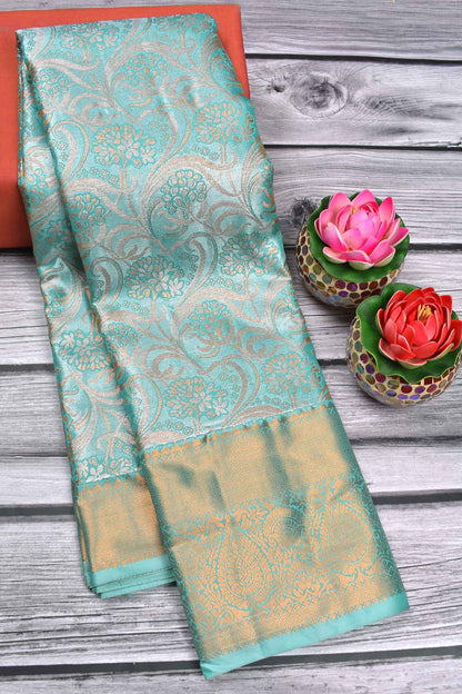 Turquoise Blue Semi Silk Tissue Floral Waves Brocade Saree