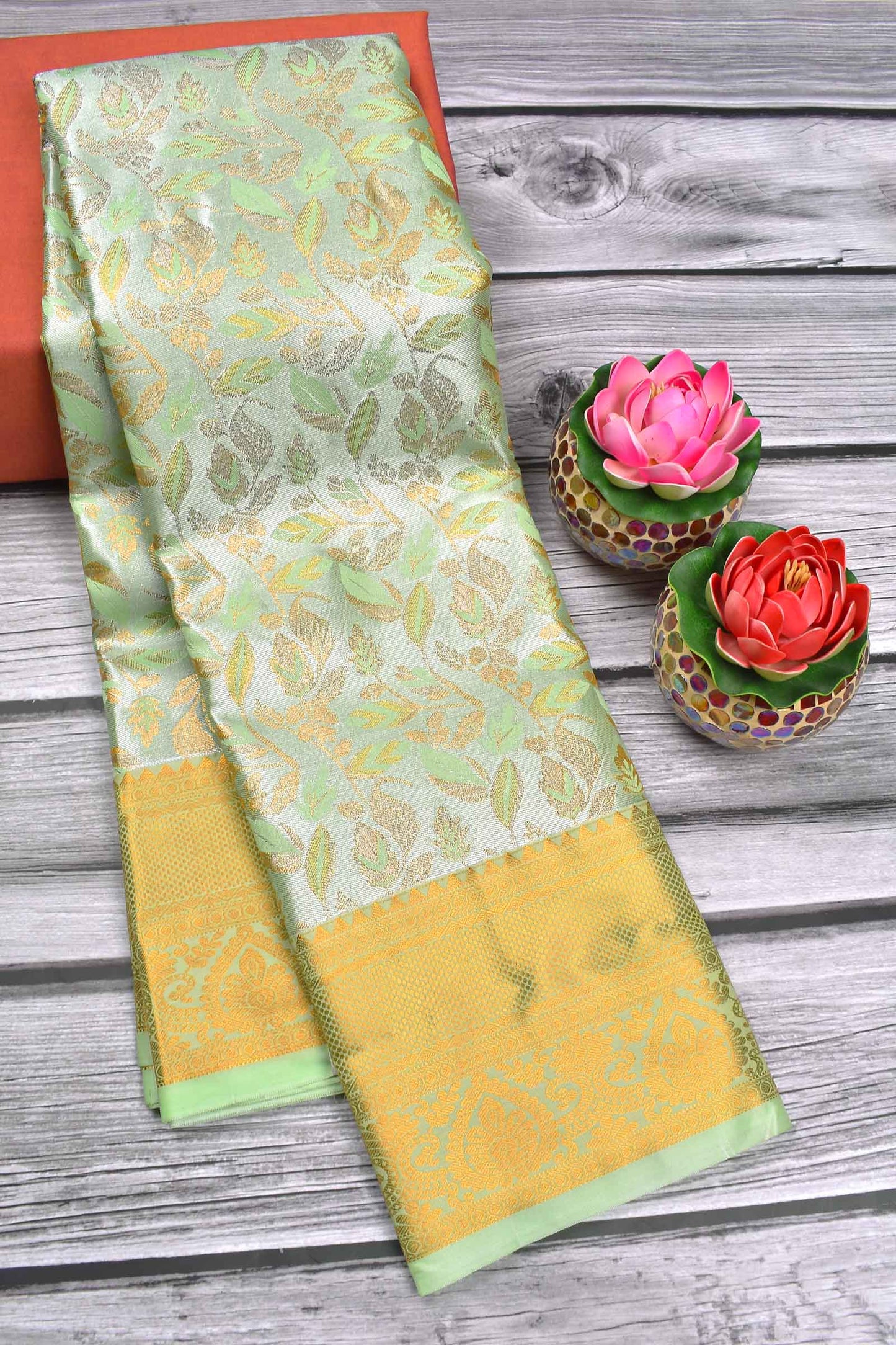 Pastel Green Semi Silk Tissue Golden Leaves Brocade Zari Border Saree