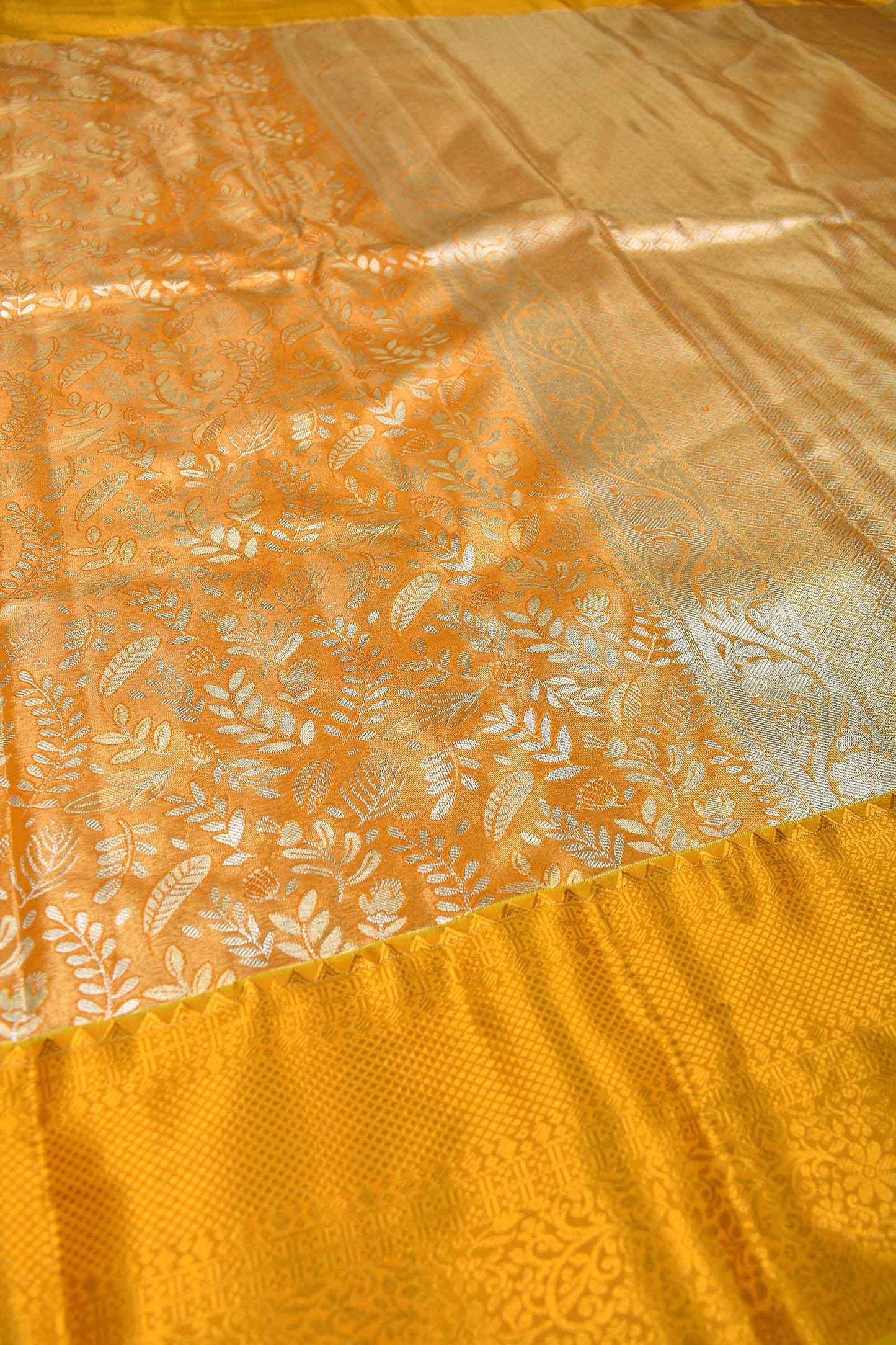 Golden Yellow Semi Silk Tissue Leaves Brocade Gold Border Saree