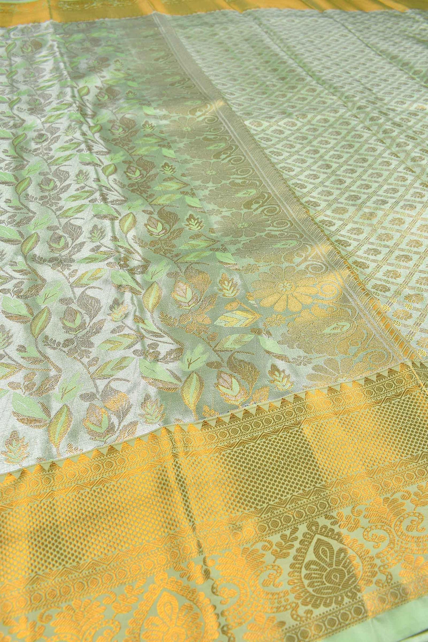 Pastel Green Semi Silk Tissue Golden Leaves Brocade Zari Border Saree