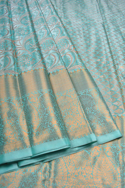 Turquoise Blue Semi Silk Tissue Floral Waves Brocade Saree