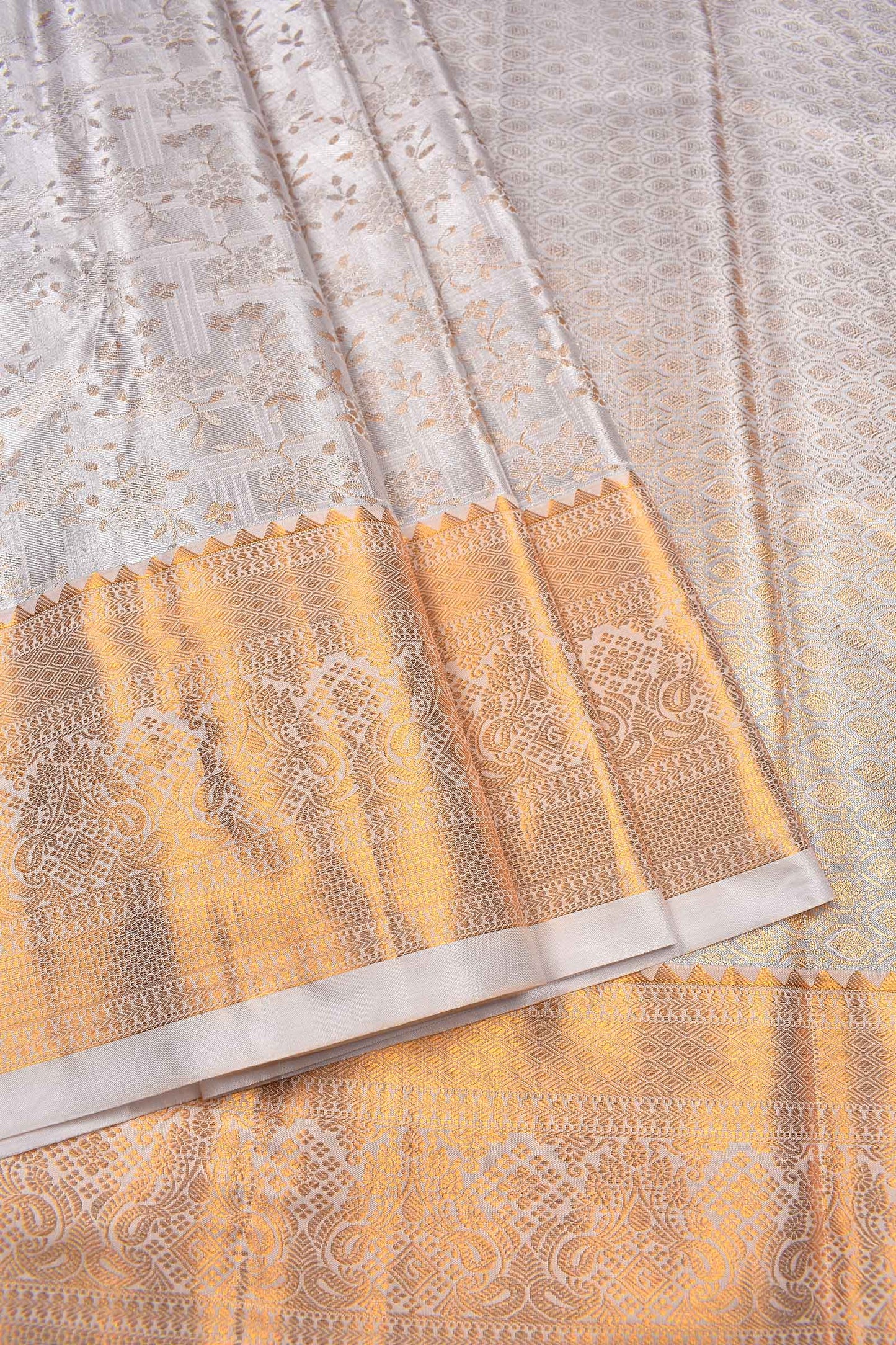 Light Grey Semi Silk Tissue Fancy Floral Checks Gold Border Saree