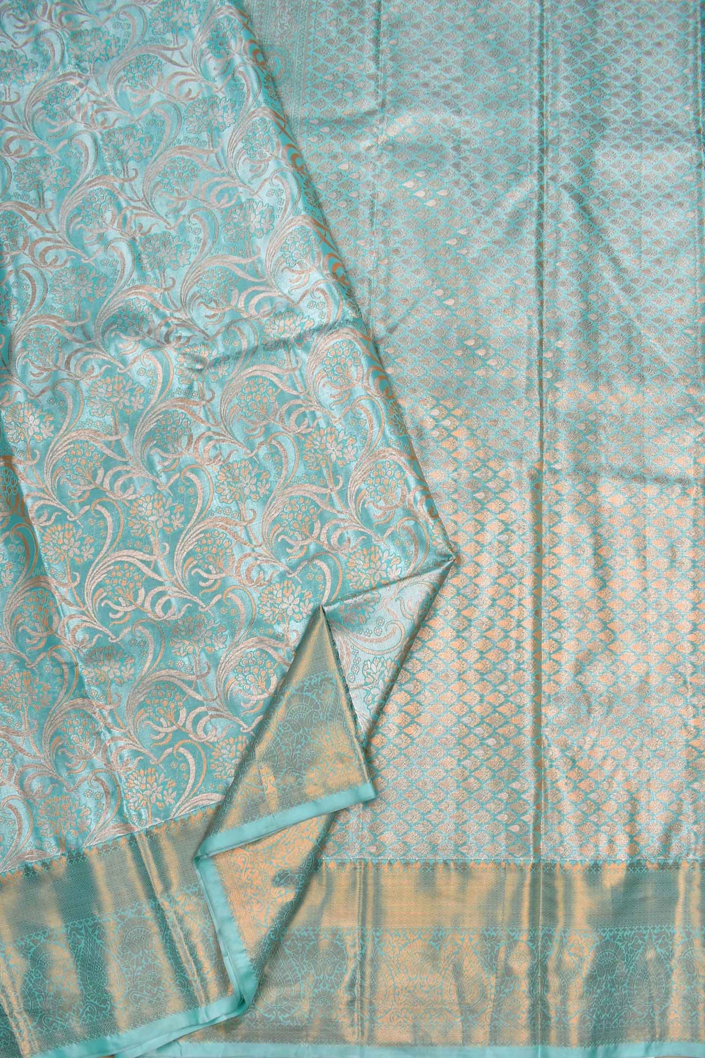 Turquoise Blue Semi Silk Tissue Floral Waves Brocade Saree