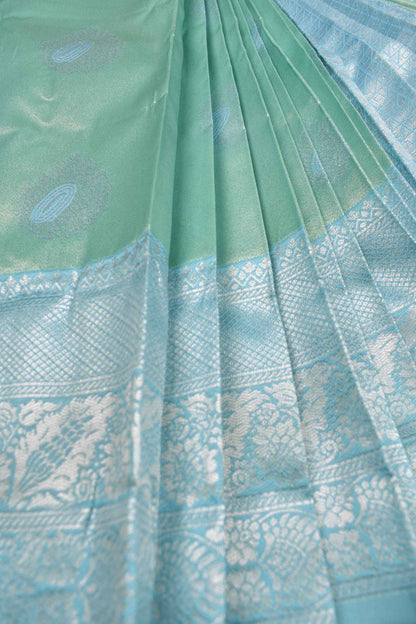 Light Green Semi Silk Fancy Butta Light Blue Pallu Border Saree