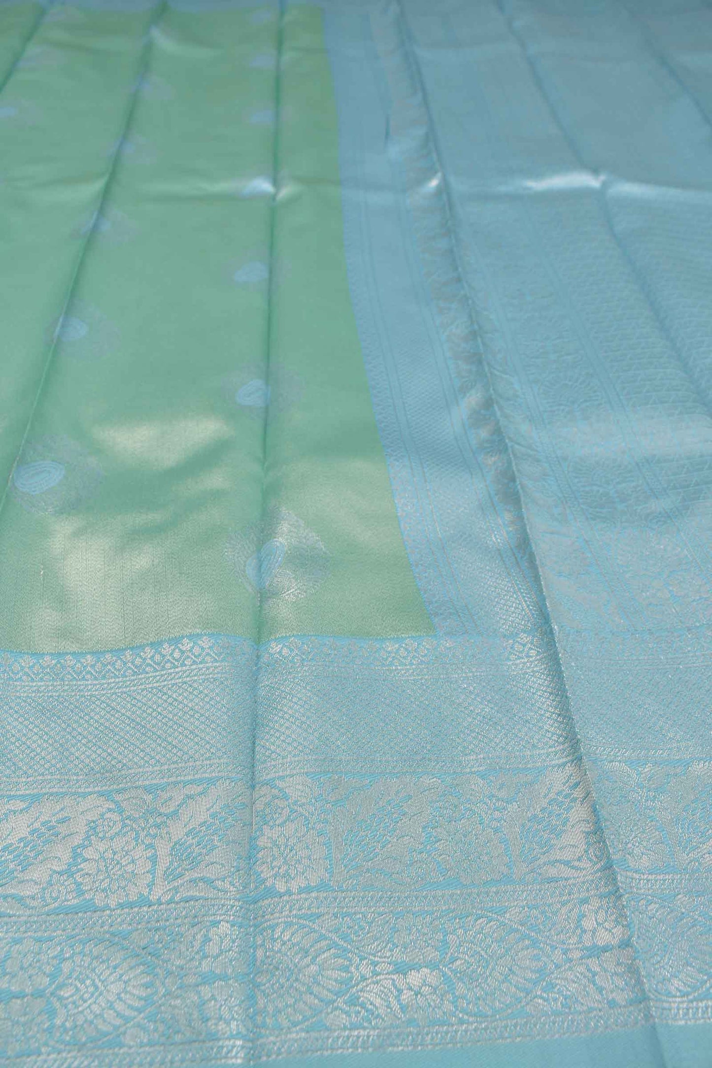 Light Green Semi Silk Fancy Butta Light Blue Pallu Border Saree