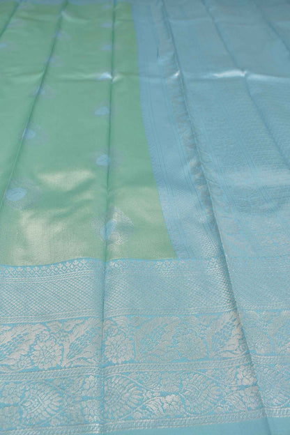 Light Green Semi Silk Fancy Butta Light Blue Pallu Border Saree