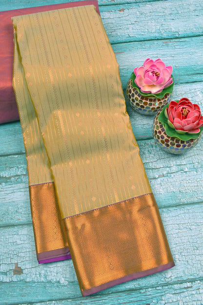 Light Green Semi Soft Silk Zari Lines Fancy Violet Border Saree