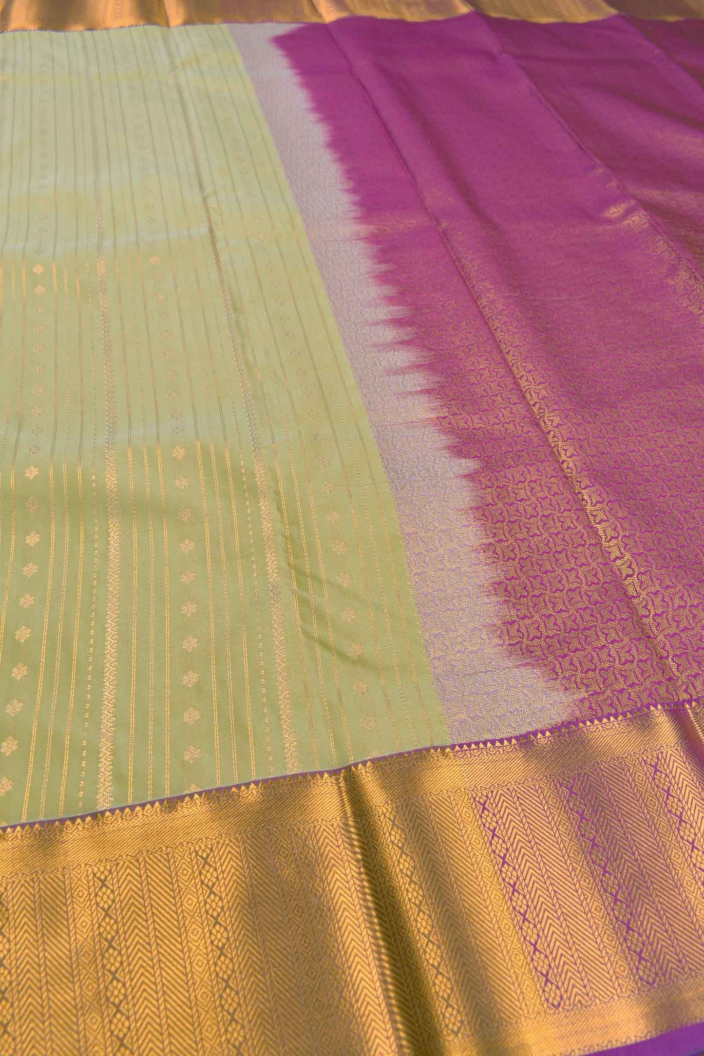 Light Green Semi Soft Silk Zari Lines Fancy Violet Border Saree