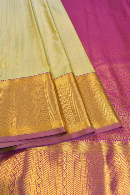 Light Green Semi Soft Silk Zari Lines Fancy Violet Border Saree