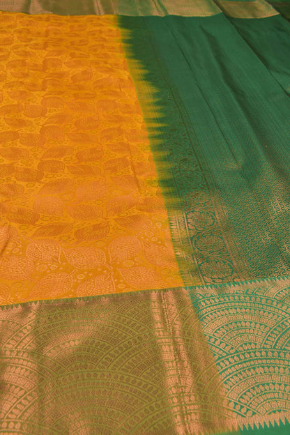 Golden Yellow Semi Silk All Over Leaves Design Fancy Green Border Saree