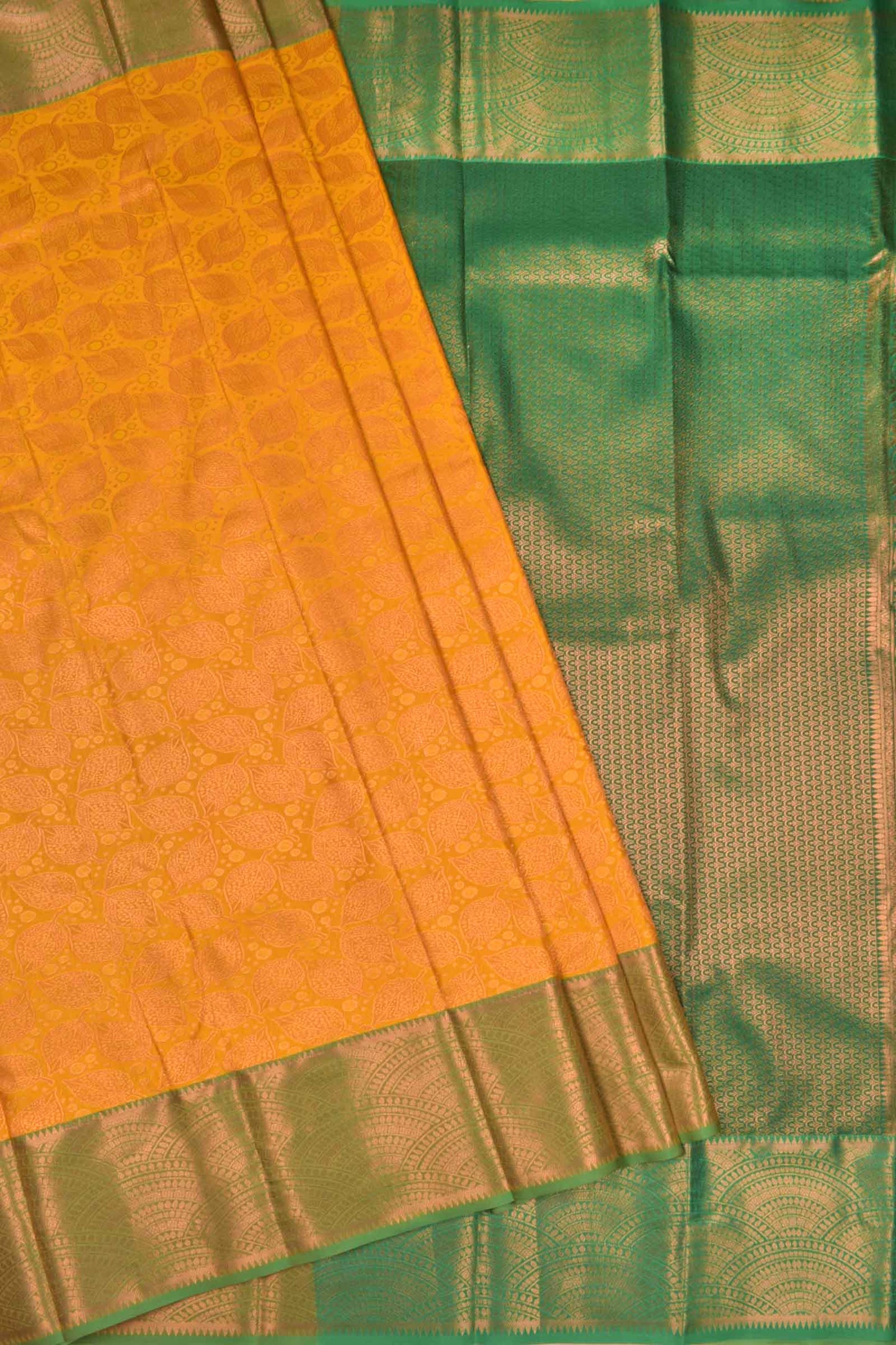 Golden Yellow Semi Silk All Over Leaves Design Fancy Green Border Saree