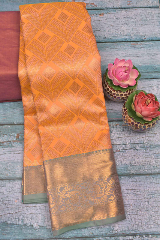 Pastel Orange  Semi Silk Fancy Butta Green Zari Border Saree