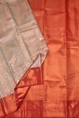 Peach With Silver Semi Silk Fancy Design Contrast Maroon Border Tissue Saree