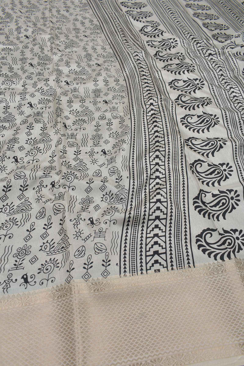 White With Black Semi Dola Warli Fancy Print Design Sandal Border Saree