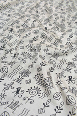 White With Black Semi Dola Warli Fancy Print Design Sandal Border Saree