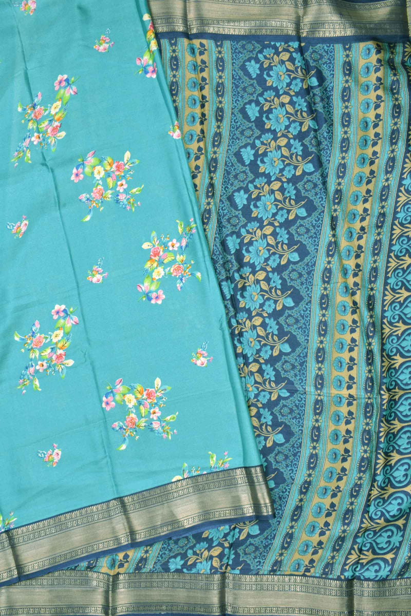 Aqua Blue Soft Marshmallow Fancy Print Contrast Blue Zari Border Saree