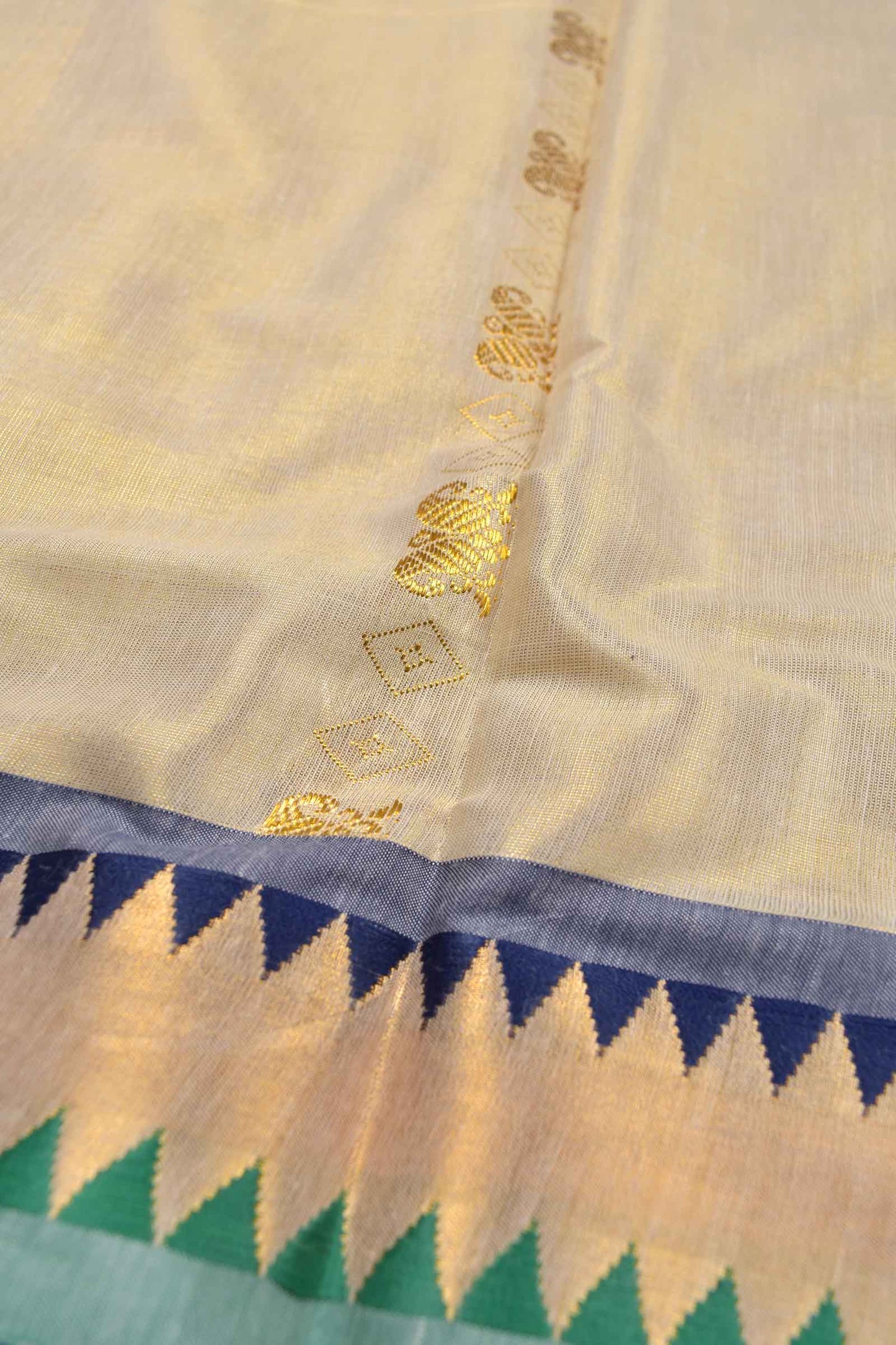 Golden Kerala Tissue Cotton Golden Waves Gold Leaves Pallu Temple Border Saree