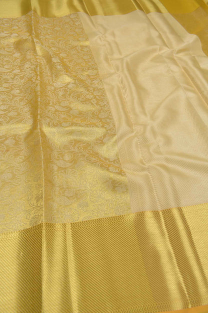 Yellow Tissue With Fancy Ivory Florals Zari Border Saree