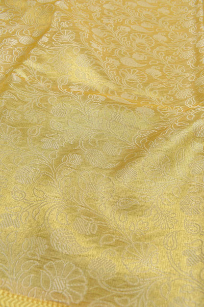 Yellow Tissue With Fancy Ivory Florals Zari Border Saree