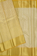 Yellow Tissue With Fancy Ivory Florals Zari Border Saree