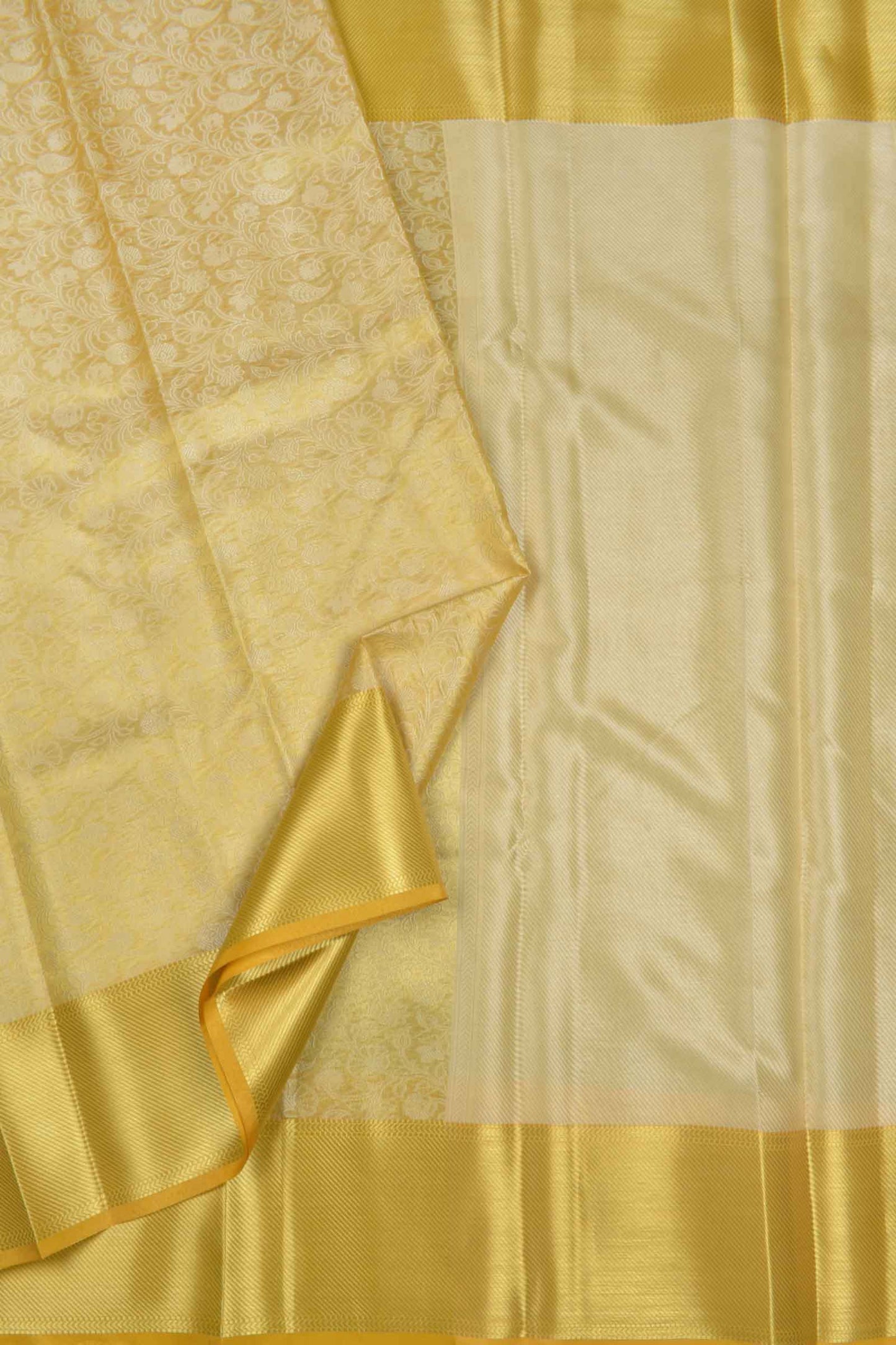 Yellow Tissue With Fancy Ivory Florals Zari Border Saree