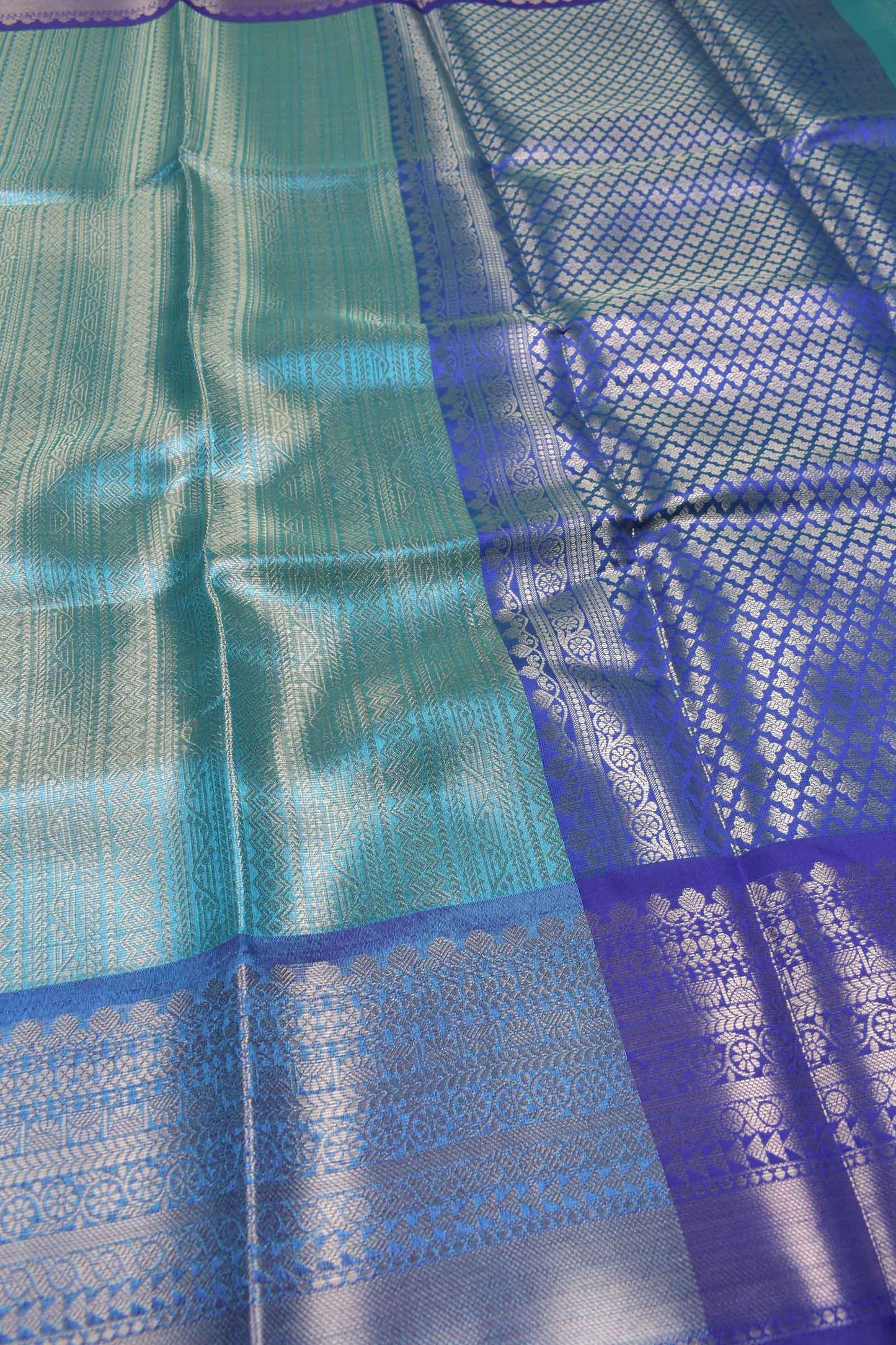 Blue Tissue  Vertical Lines Contrast Navy Blue Zari Border Saree