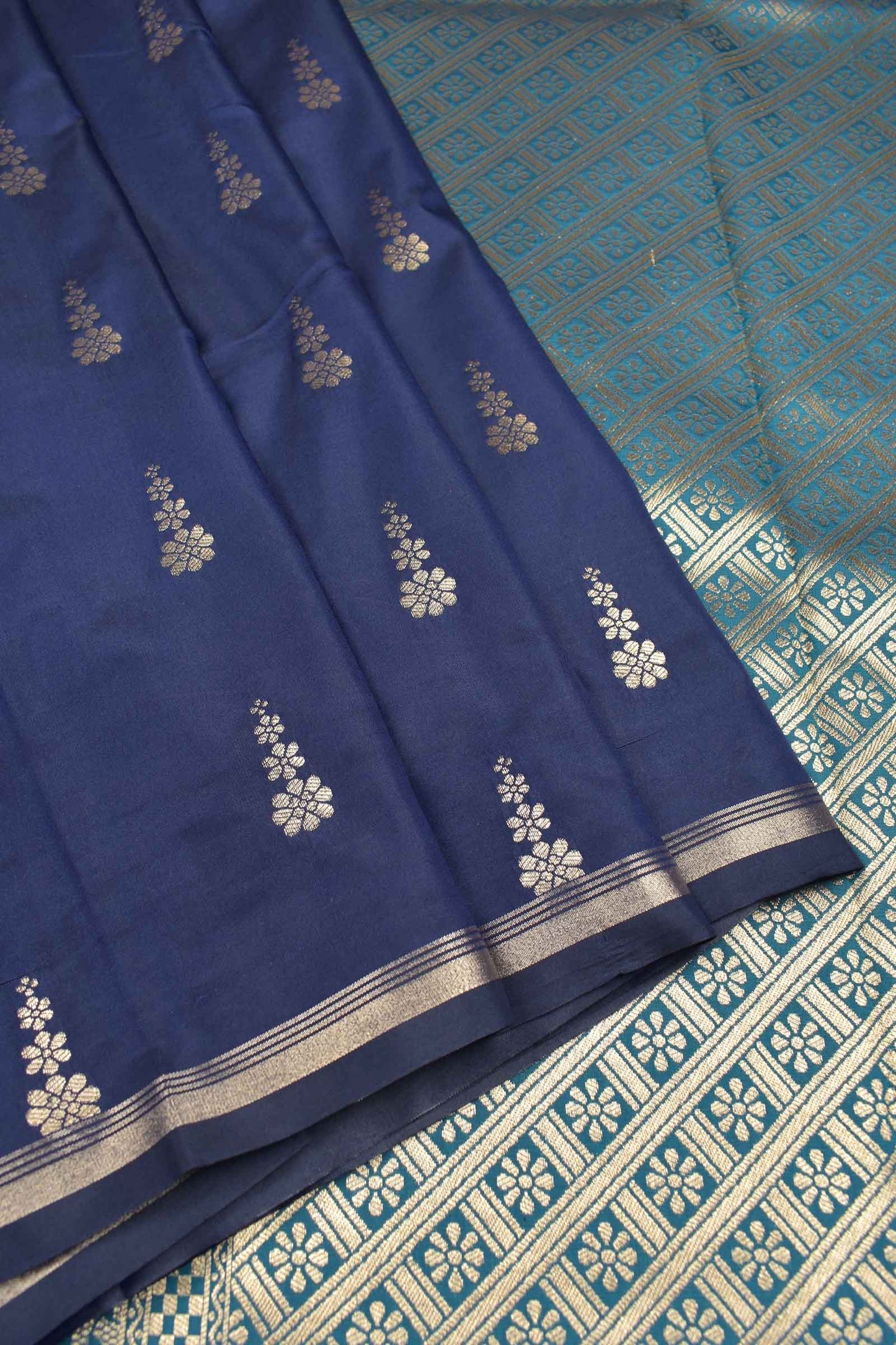 Denim Blue Body Flowers Butta Contrast Pallu Semi Soft Silk Saree